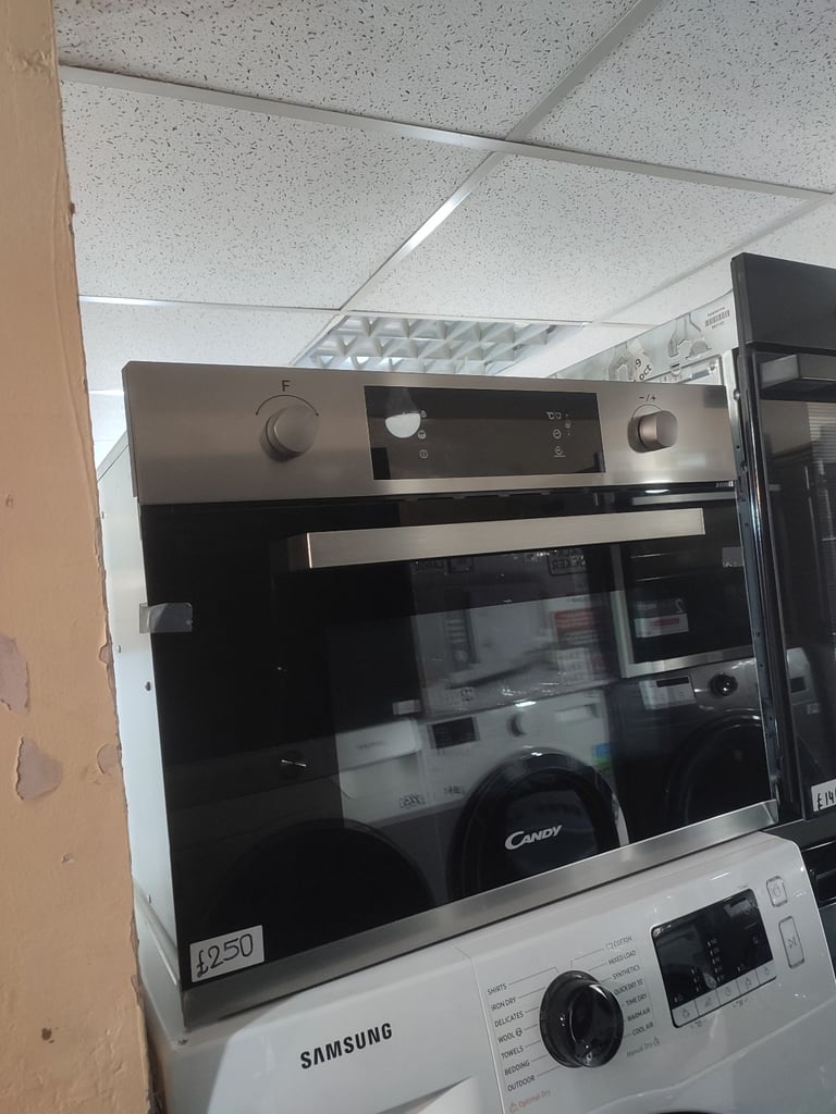 ➡️➡️REDUCED⬅️⬅️ NEW GRADED CANDY 44L BUILT IN COMBINATION MICROWAVE OVEN AND GRILL