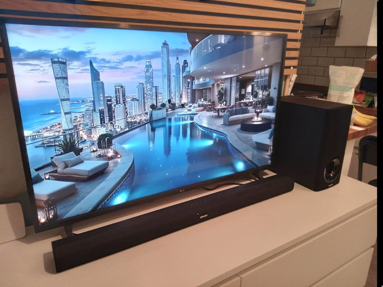 LG 43 " TV with Denon Soundbar + Subwoofer 