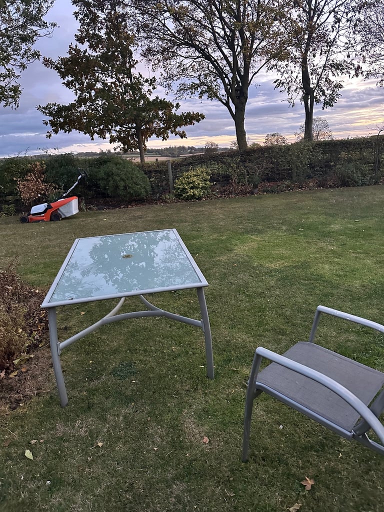 Garden table and 6 matching chairs