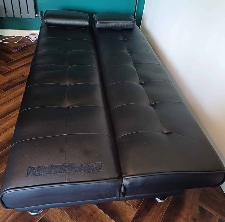 Leather sofa bed like new (can deliver)