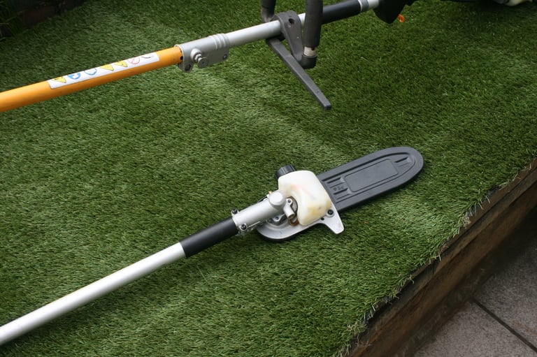 petrol strimmer, with pole pruner, brush- cutter attachments excellent condition