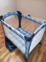 Travel cot never used