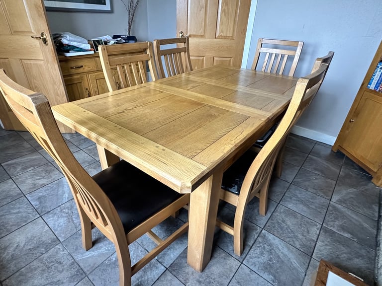 Extendable Oak Dining Table with 8 Chairs