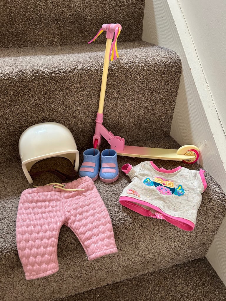 Our Generation Doll’s scooter, skateboard and helmet with outfits