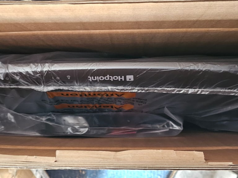 Black Hotpoint HTV10B is a 60 cm wide conventional hood