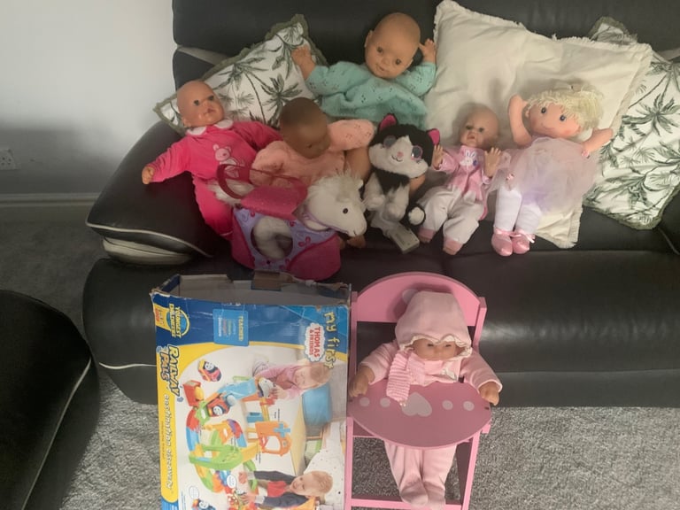 Assortment of child’s dolls and tous