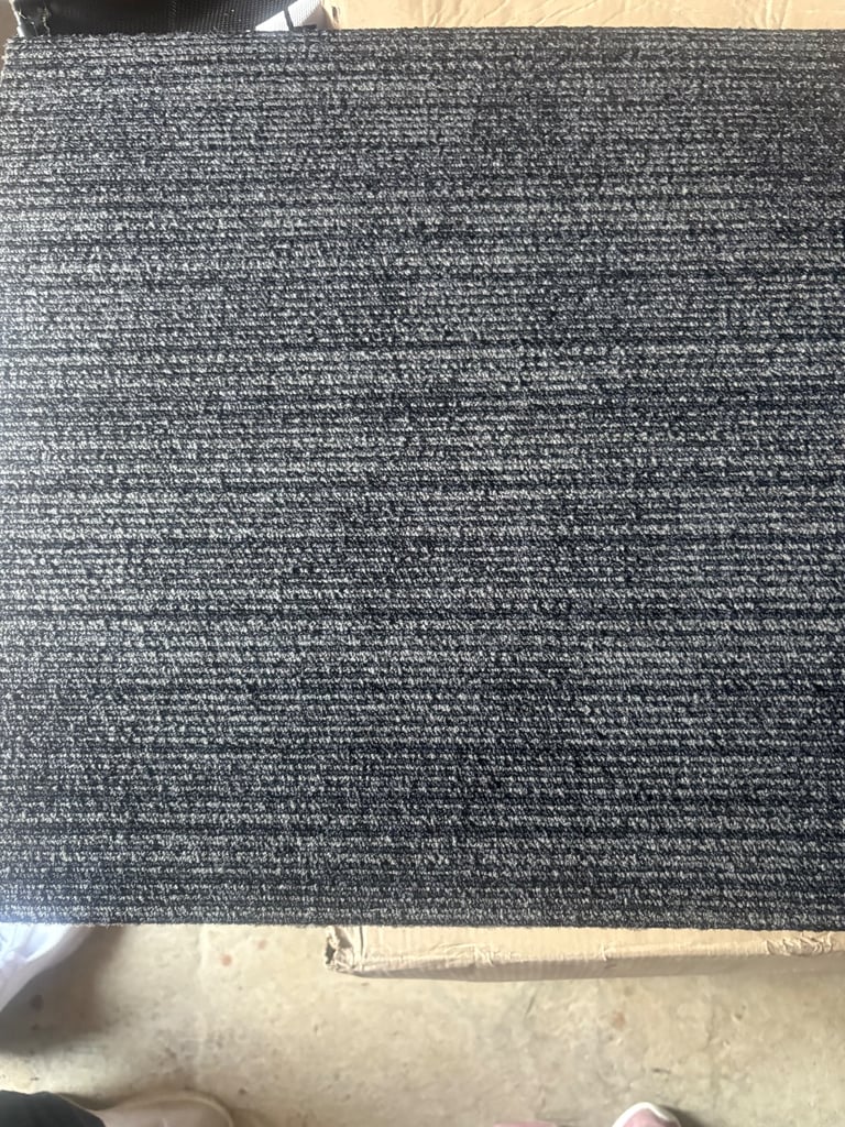 2 boxes of carpet tiles 