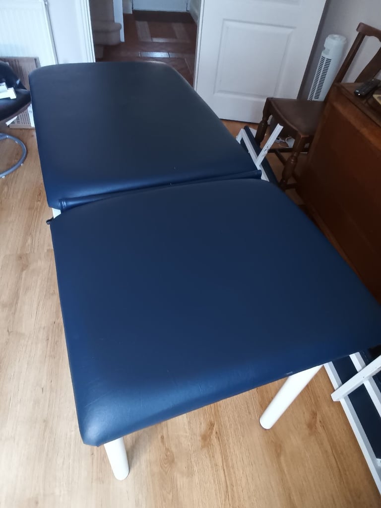 Meditelle small adult/ paediatric static couch with padded sides.