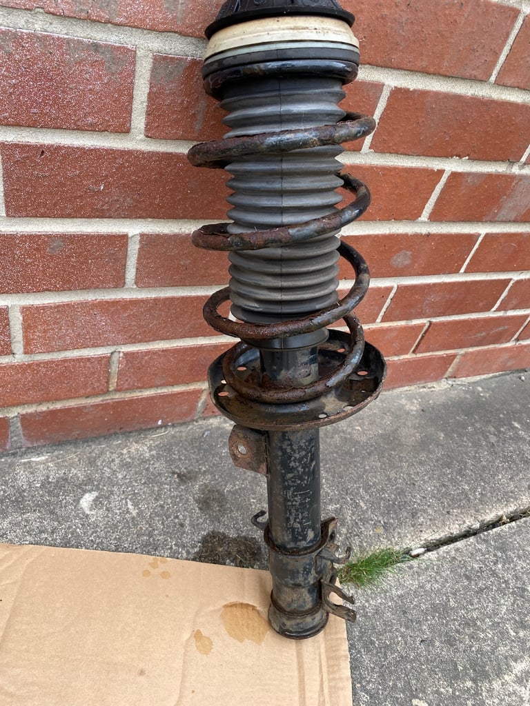 image for Vauxhall corsa shock absorber with leg and brake discs with wheel hub (genuine) driver side 
