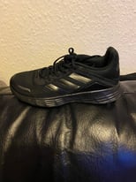 Adidas’s black size 5 training shoes 