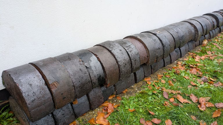 Reclaimed blue half-round bricks