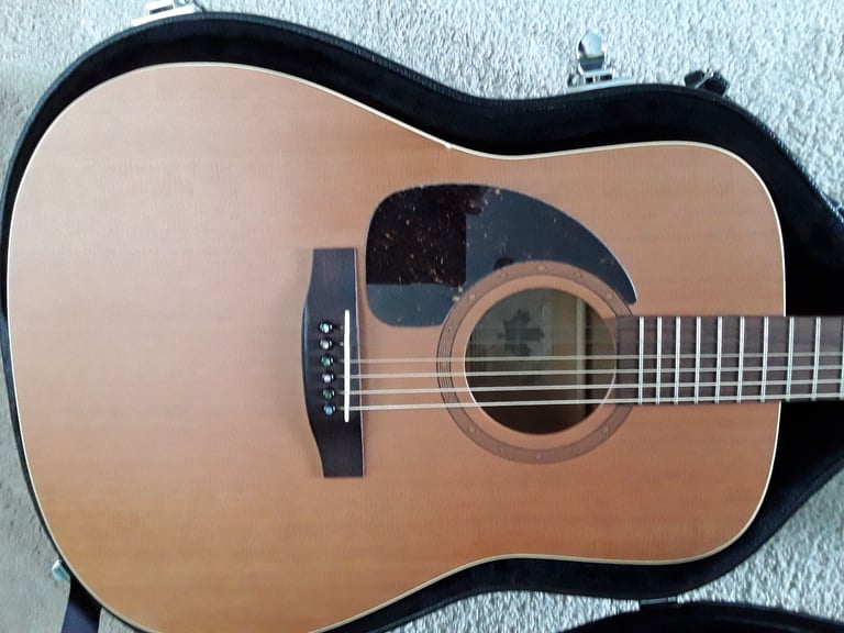 Left handed Norman B18 acoustic guitar, made in canada.