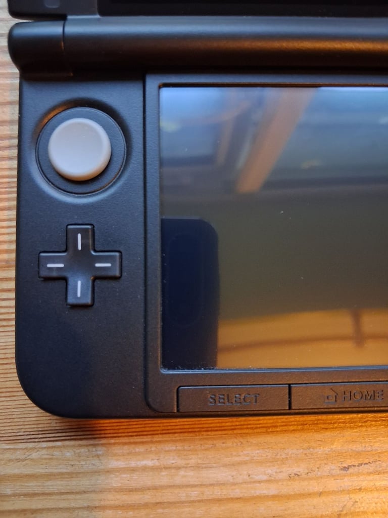 Silver Nintendo 3DS XL Package. Excellent condition. No scratches. Barely used.
