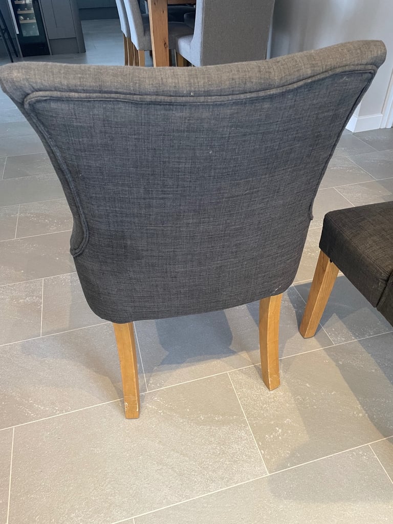 4 Grey fabric button back dining chairs with oak legs 