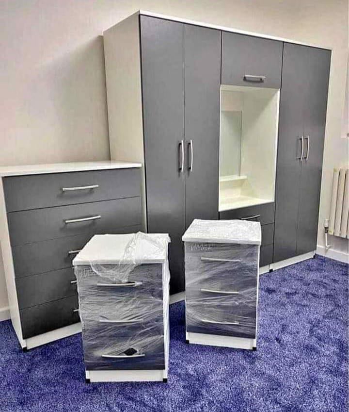 Modern Bedroom Furniture. Bedroom Suit Includes Bedside Tables, Chest of Drawers and Wardrobes