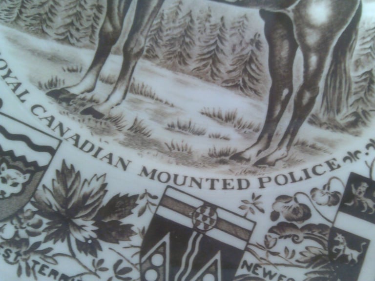 the royal canadian mounted police   plate      burslem / wood   10 in  