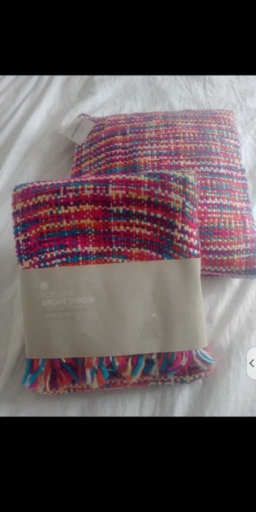 Rainbow blanket and pillow set. 