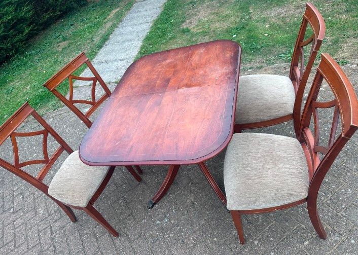 Excellent wooden Dining table with 4 solid chairs for £85