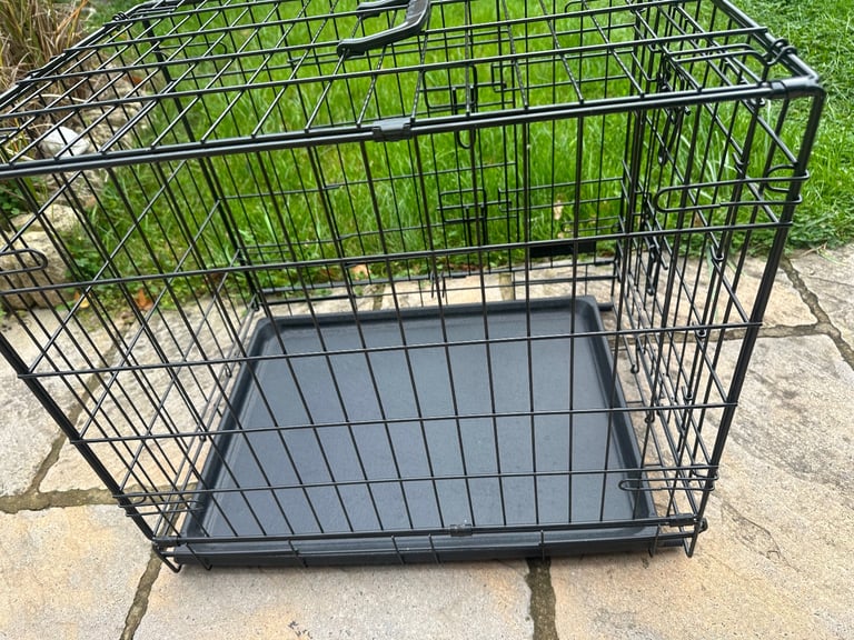Lovely black dog crate for small/toy dog.