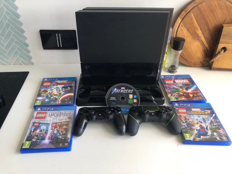 PS4 Console + 2 Controllers + 5 Games + Docking stand | in Coventry, West  Midlands | Gumtree