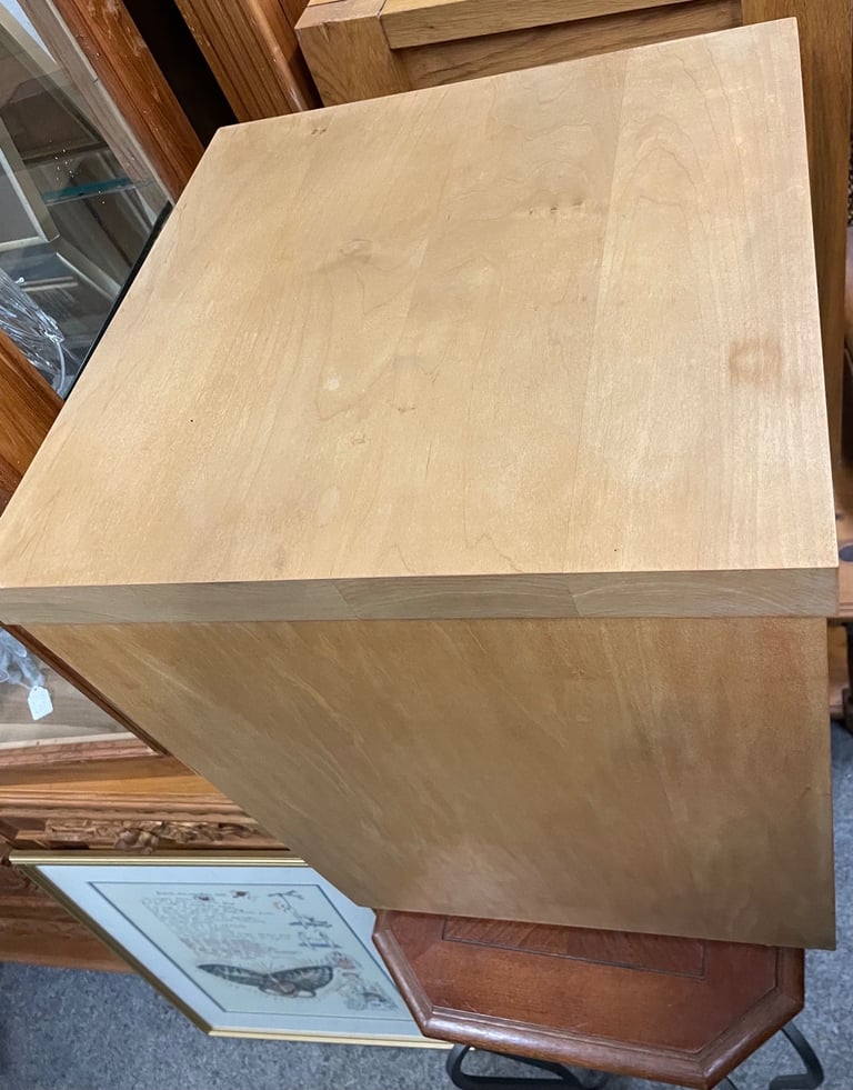 Solid wood, chest of three drawers.