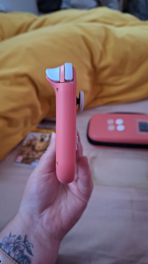 Nintendo switch lite coral pink 