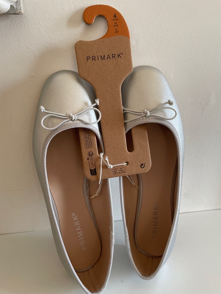 Silver Pumps.  Size 4