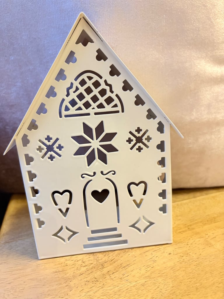 Avon.  Christmas t-light candle holder.