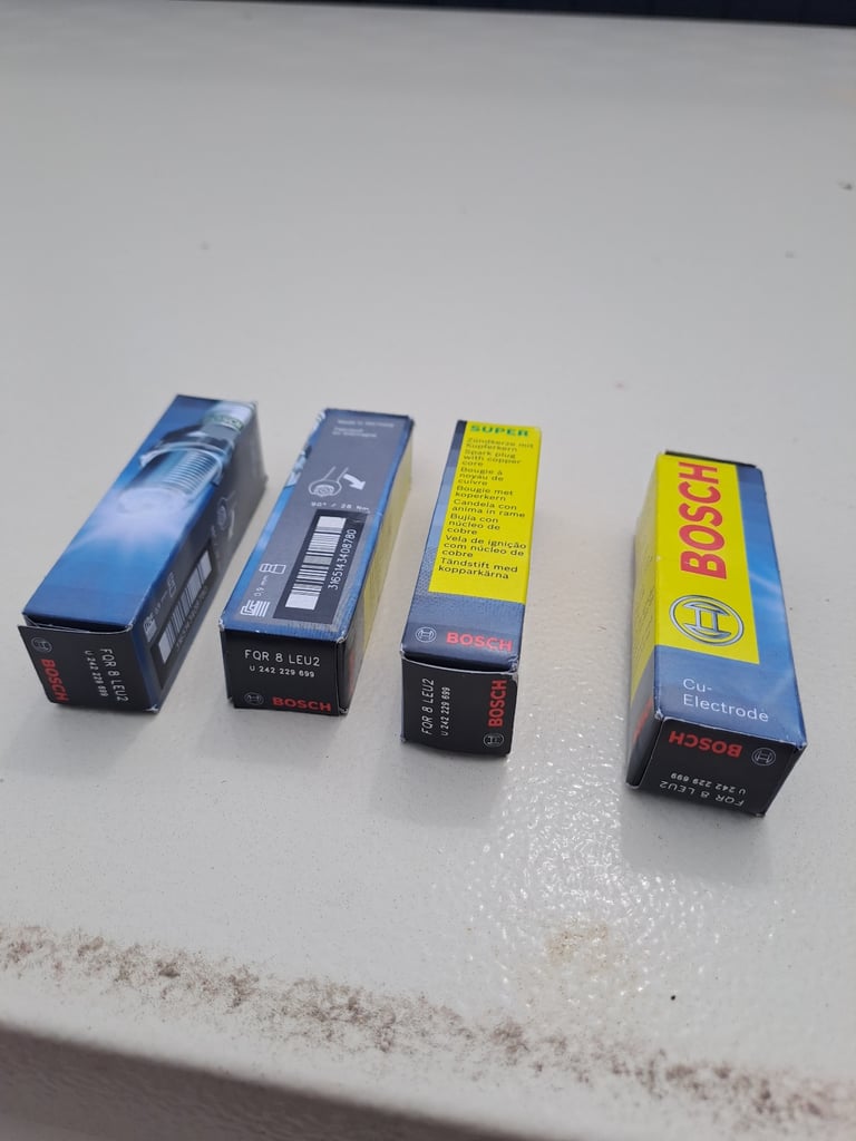 4 x Bosch spark plugs FQR 8 LEU2.  Brand new