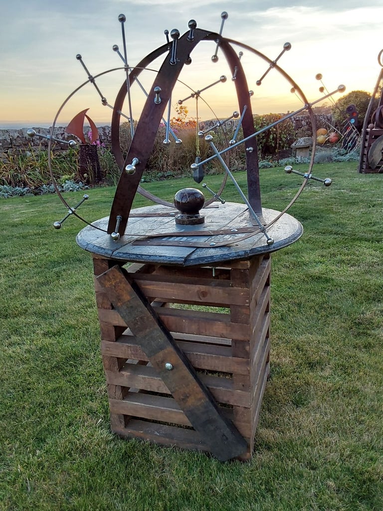 image for Rustic garden art from recycled whisky barrel materials 