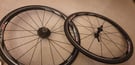 Pair of Shimano 622 x 15c alloy wheels with continental gatorskin bicycle tyres