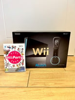 Nintendo Wii Console with Wii Sports and Wii Party