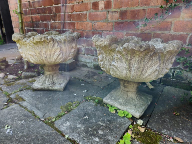 Two stone garden urns