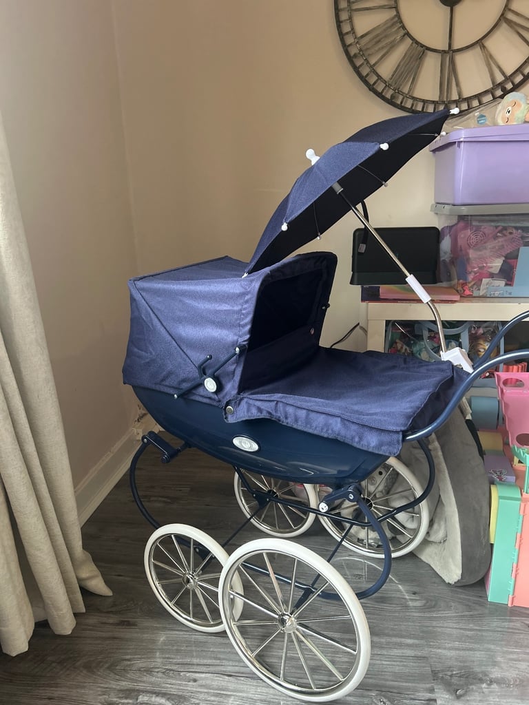 Navy dolls pram 