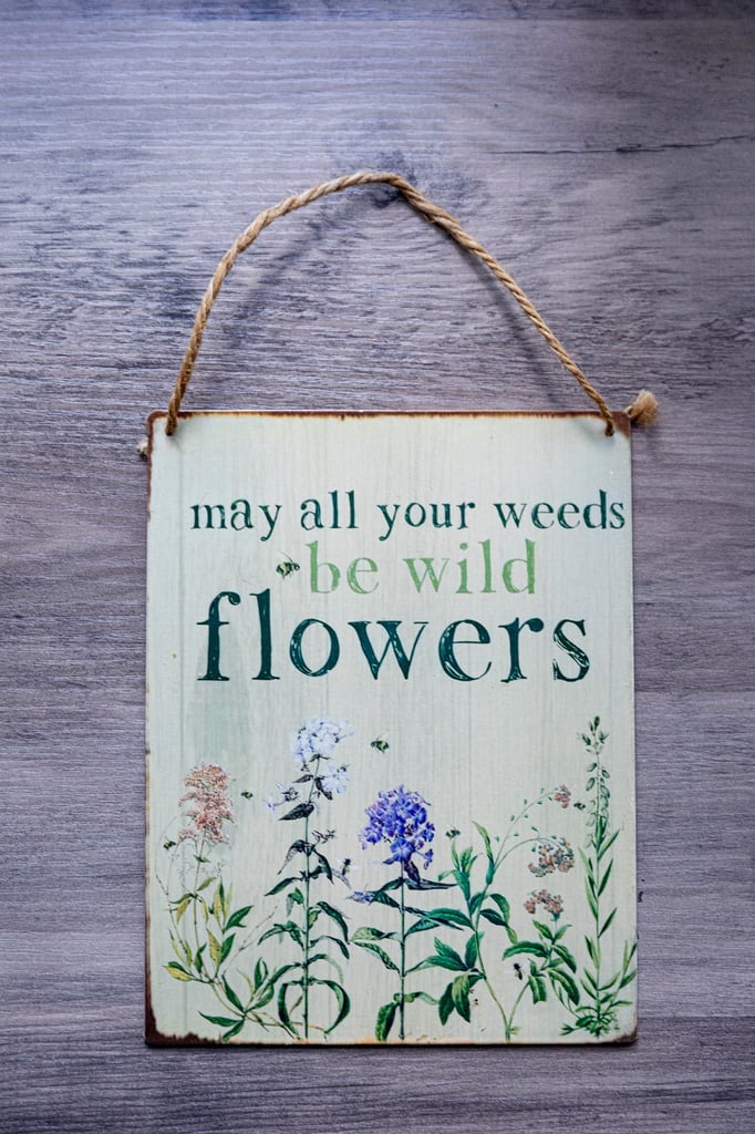 image for Metal &quot;May all your weeds be wild flowers&quot; decor plate