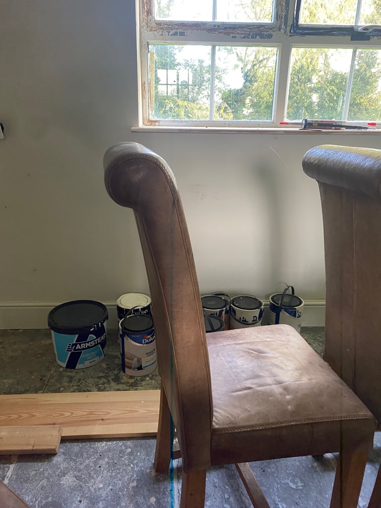 4 Tan leather and wood dining chairs