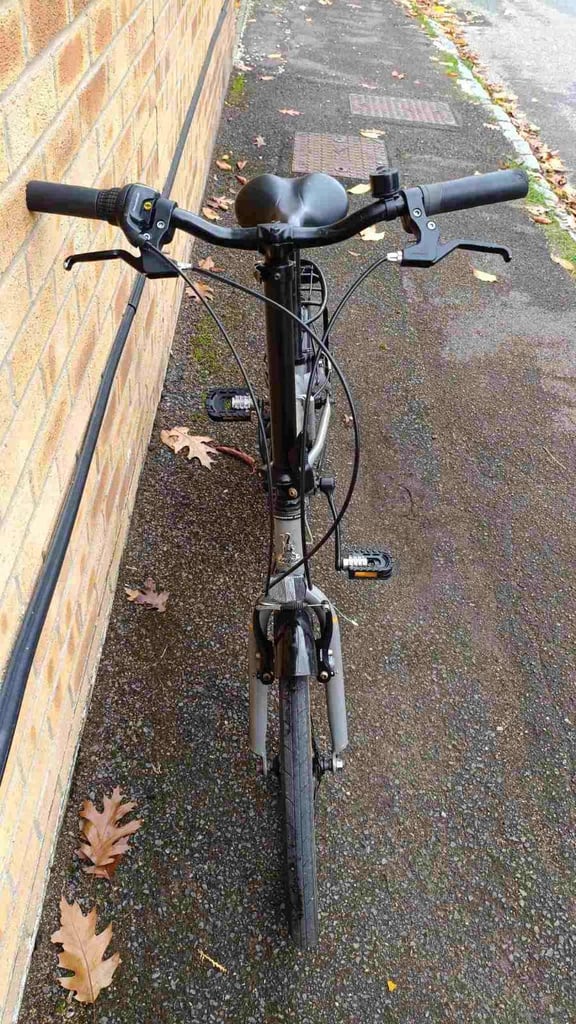 Raleigh Folding Bike in good condition with a comfort saddle, mudguards, rear pannier rack
