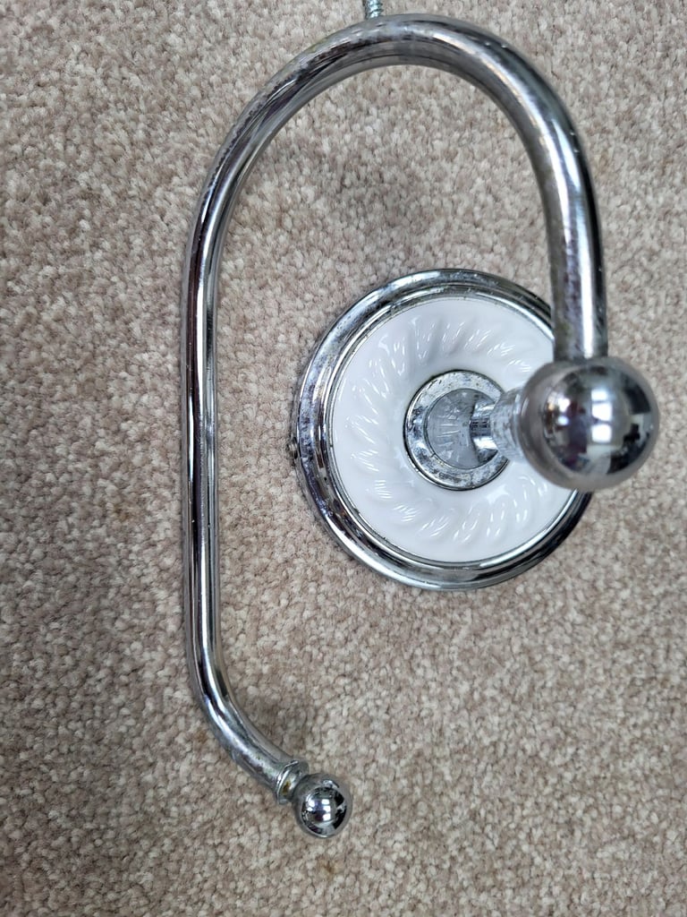 Towel rail and toilet roll holder