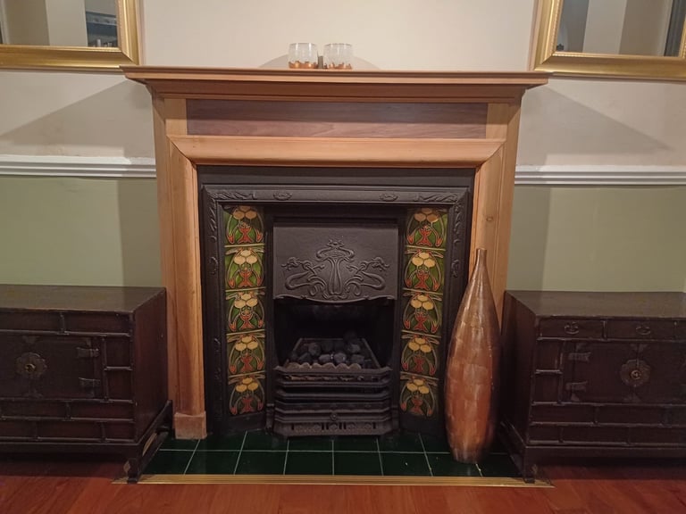 Fireplace surround, wood mantle, tiles cast iron. Used