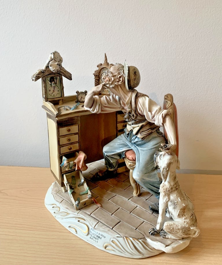 Rare hand-painted Capodimonte porcelain sculpture “Orologiaio” by Tiziano Galli