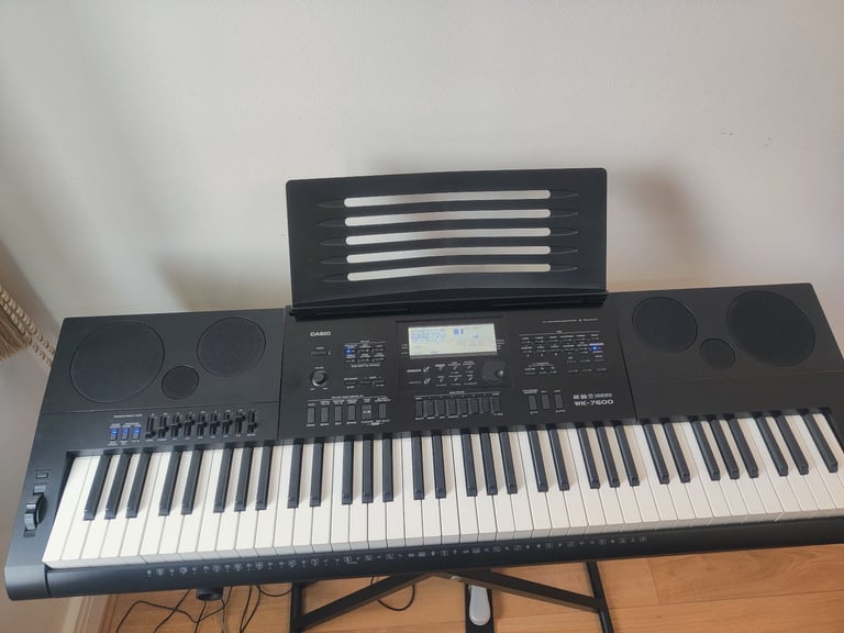 Casio WK-7600 76 Key Piano Style Portable Keyboard with Metal Stand and Pedal