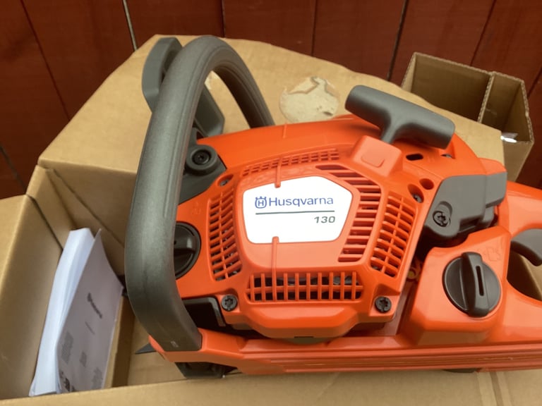 Husqvarna 130 chainsaw 14 in petrol brand new still in box 
