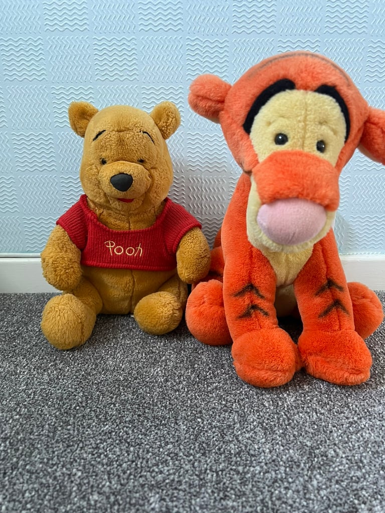 Winnie the Pooh and Tigger soft toys 