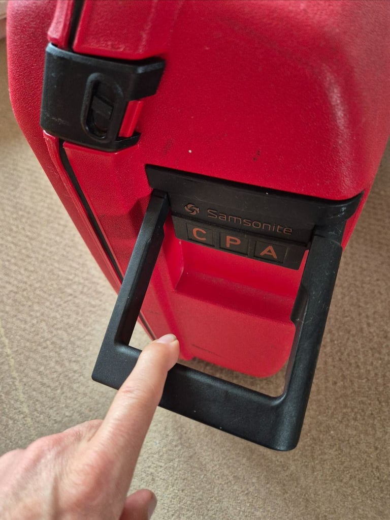 Samsonite Large Red hardshell CPA suitcase with combination Lock
