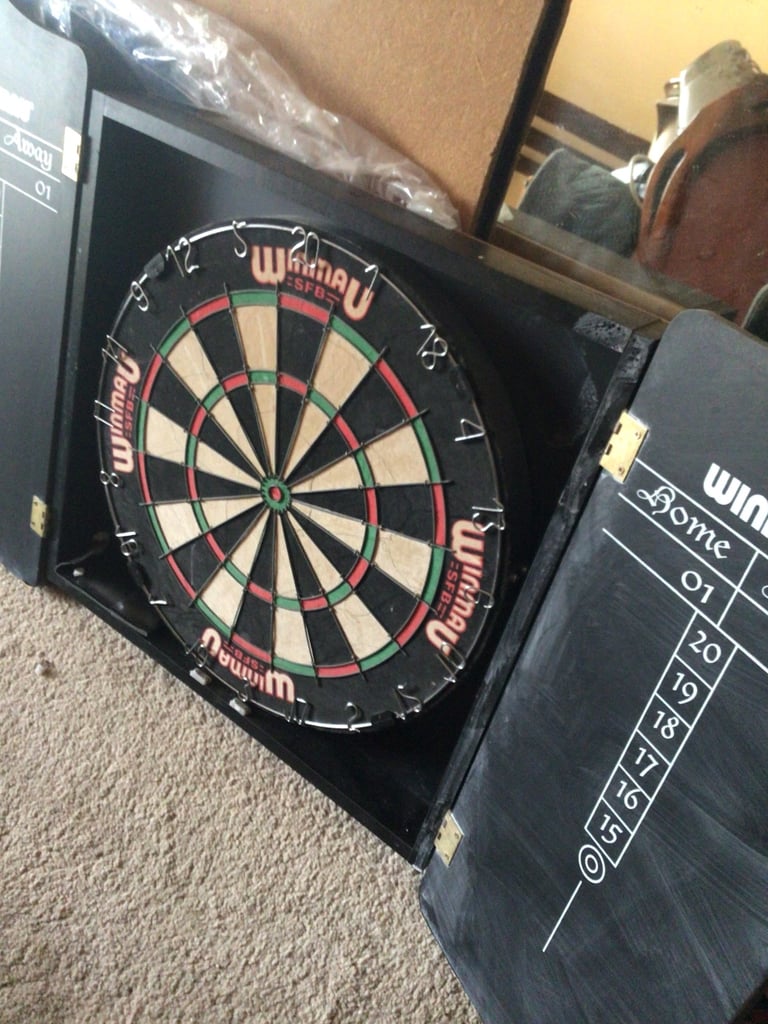 Winmau SFB dartboard. In cabinet 
