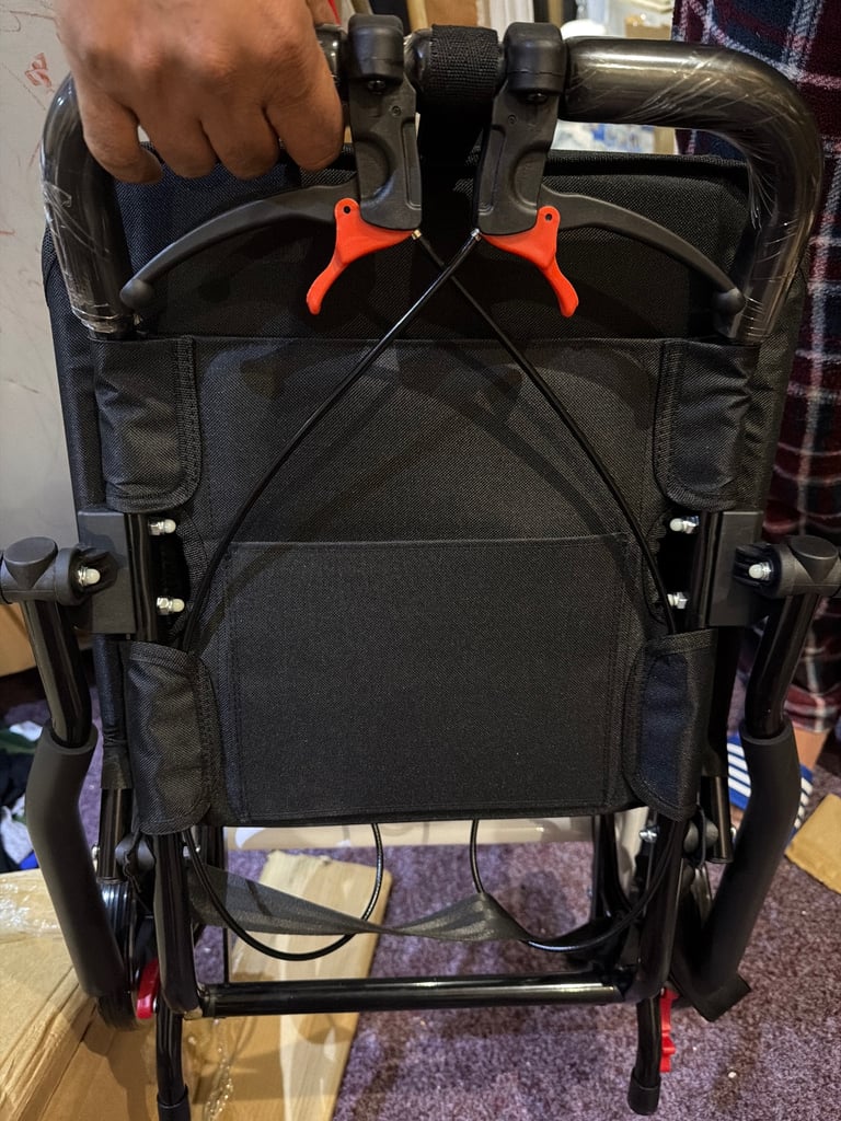Transport lightweight wheel chair brand new 