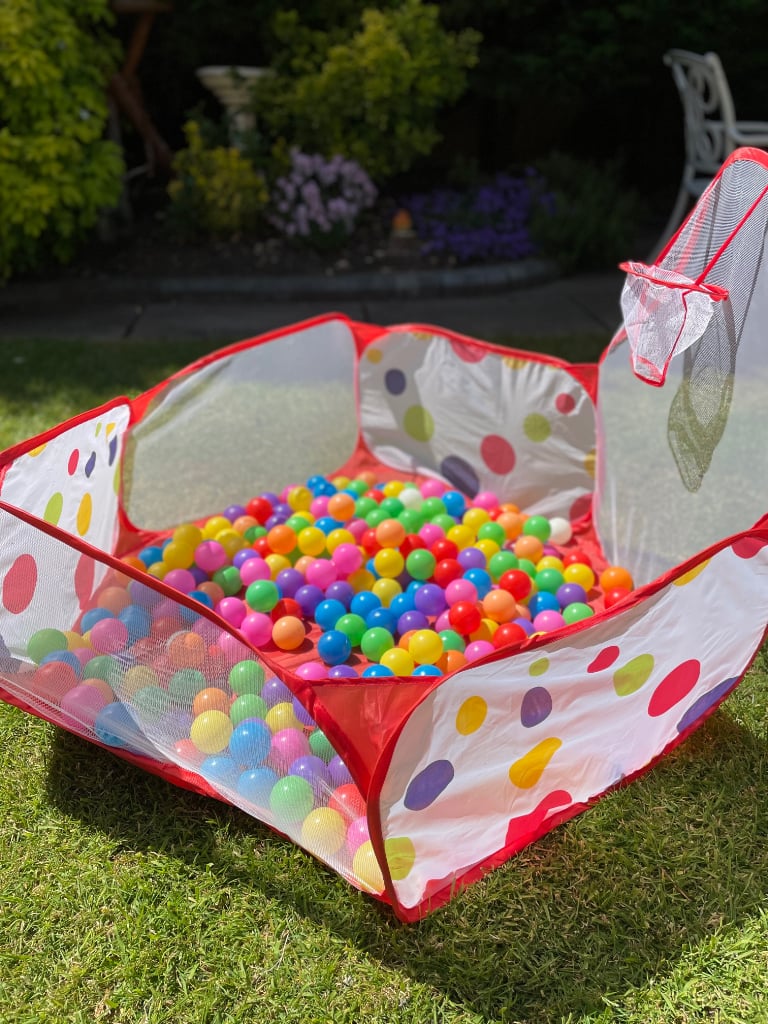 Ball pond with coloured balls.