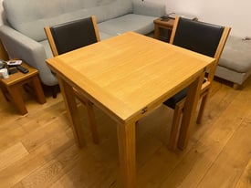 Extendable solid oak dining table and 4 chairs