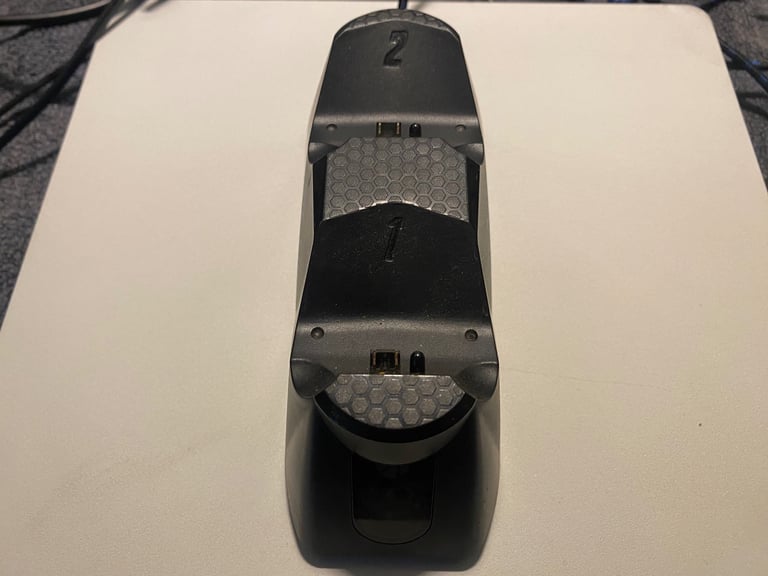 PS4 with 3 games, 1 wireless controller and docking station/charger for controller