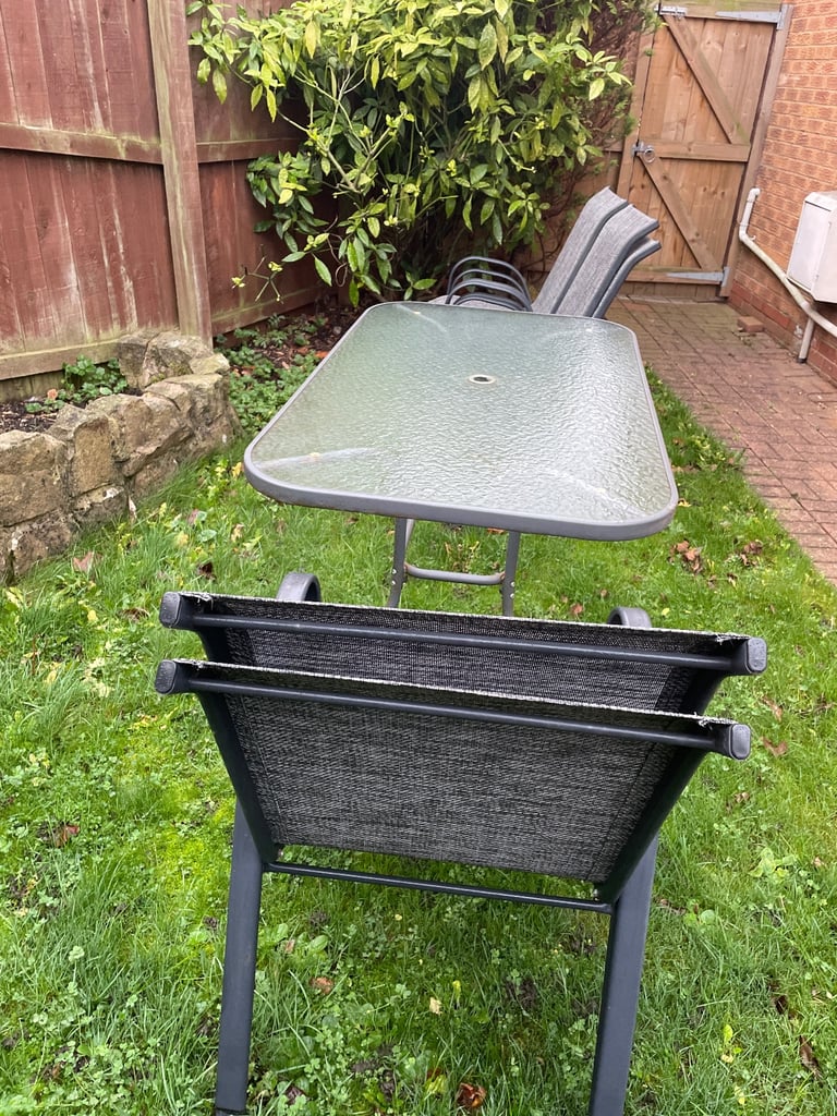 image for Free patio table and six chairs 